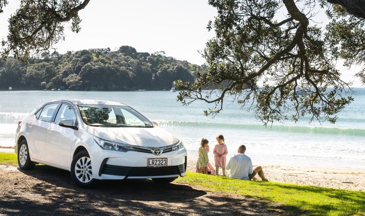 Car in front of beach