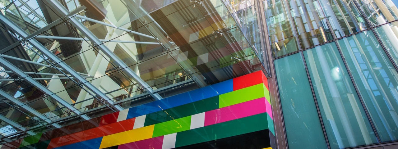 Glass building and art work at Jellicoe Street in Auckland