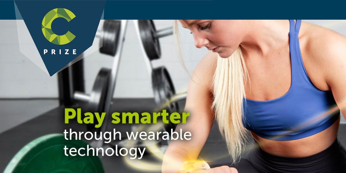 Play smarter through wearable tech - woman in gym with smart watch