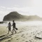 Man and woman enjoying a beach walk