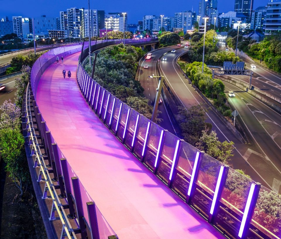 Tech Auckland - Commerce - Auckland Te Ara I Whiti pink light path at night