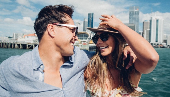 Couple smiling on Auckland ferry
